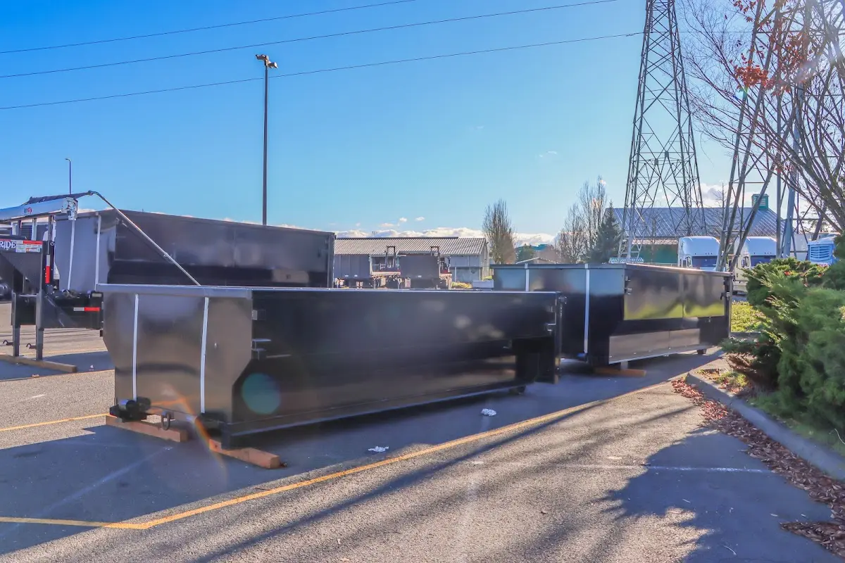 Roll-off dumpster ready for waste disposal at job site for 3 Yard Dumpster Rental in Homestead